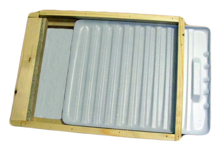 Clean oil tray used to trap small hive beetles. It has a wooden frame with a removable metal tray in between mesh lining.